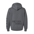 Gray hoodie with 'Dressed Down' text on the back against a white background