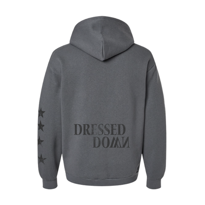 Gray hoodie with 'Dressed Down' text on the back against a white background