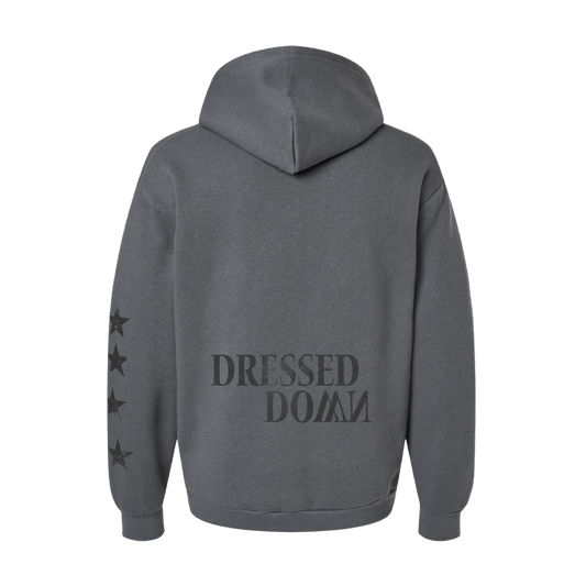 Gray hoodie with 'Dressed Down' text on the back against a white background